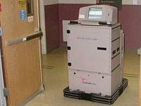A robot is used to deliver trays to the Emergency Room and Outpatient Services area.