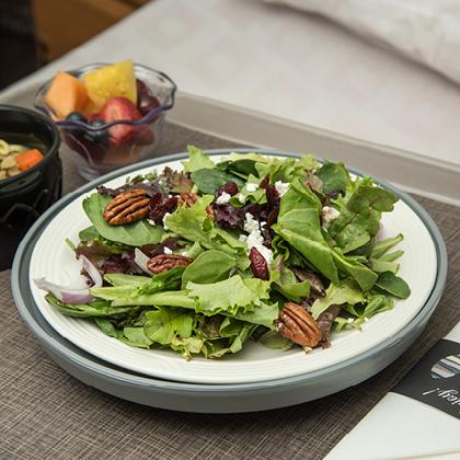 salad on plate inside a Coolbase